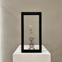 Lady Balancing On Chair Stack 40x20cm