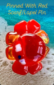 Image of Pinned With Red