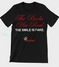 The Boobs are Real; The Smile is Fake