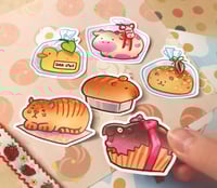 Image 2 of Land loaves | Keychain & Sticker pack