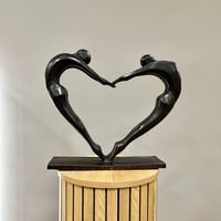 Image 1 of Couple Stretching Forming A Heart 46cm