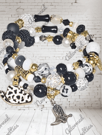 Image 1 of ANA826164 - Black, white, gold memory wire bracelet