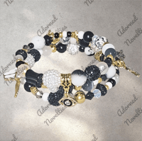 Image 3 of ANA826164 - Black, white, gold memory wire bracelet