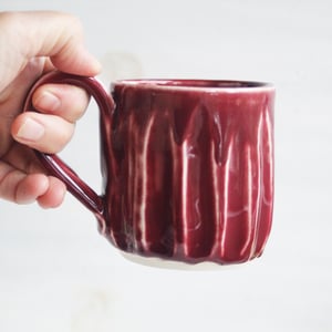 Image of Hand Carved Grooved Pottery Mug in Ox Blood Glaze, Creative Coffee Cup Made in USA (B)