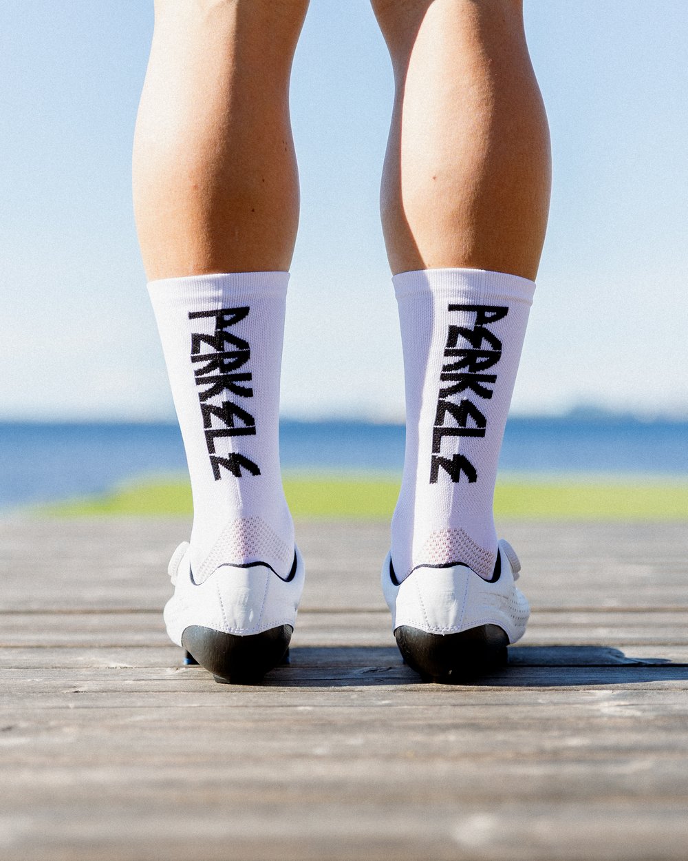 Image of White 7 inch tall 'PERKELE' sock 2024