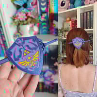 Image 1 of Horquilla escudo Zelda morado iridiscente
