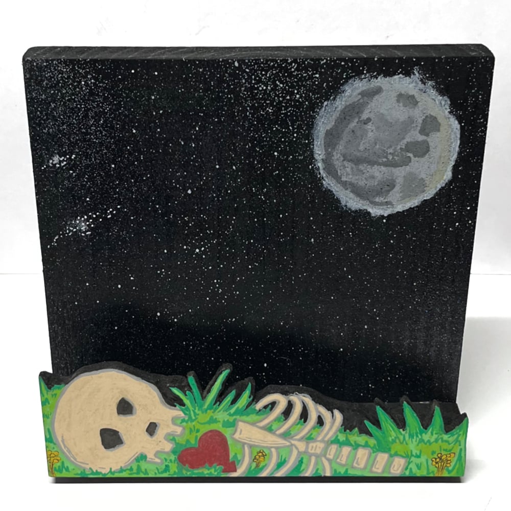 Image of Skull guy under the moon