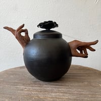 Image 5 of a handheld teapot