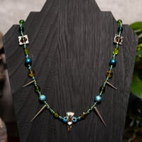 Image 2 of Googly Eye Crow Guy necklace