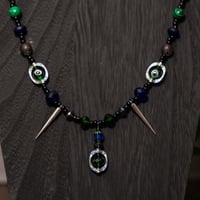 Image 1 of Jewel tone spikey eyes necklace