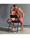 Johnny astride a chair 