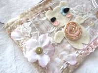 Image 2 of blossoming pouch 