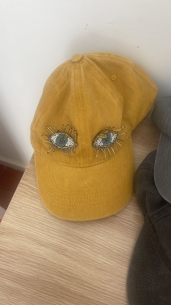Image of Boné olhos amarelo