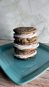Image 1 of Cookies & Cream Cookie Sandwich. 