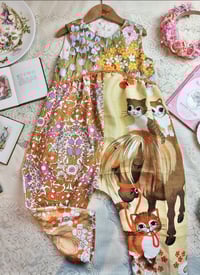 Image 1 of Marigold 4-5y cat teatowel leg. 