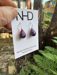 Image 8 of Purple with Orange Drops