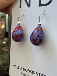Image 7 of Purple with Orange Drops