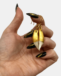 Badger canine earrings
