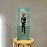 Image 1 of Woman Sitting In Glass Frame 52cm
