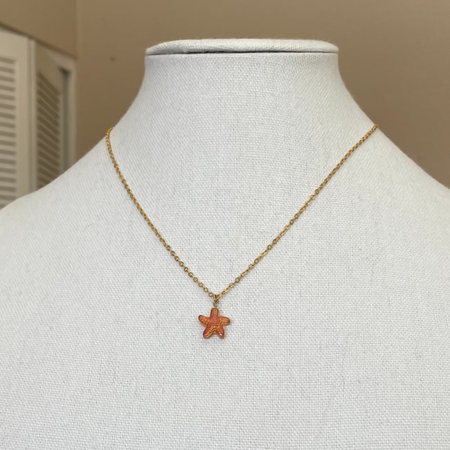 orange starfish gold chain necklace