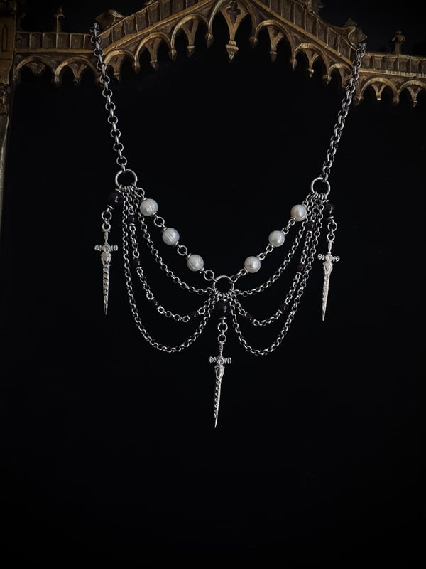 Image of three of swords necklace