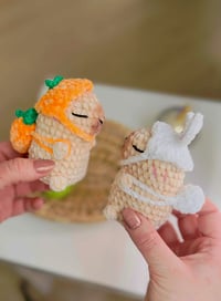Image 5 of Mini Amigurumi Capybara Keychain – Handmade Plush Toy - Kawaii Crochet Bag Charm