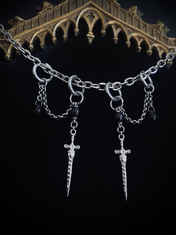 Image of die by the sword earrings