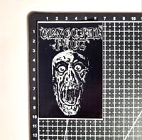 Image 2 of Genocide Pact Melting Face Glossy Finish Vinyl Sticker