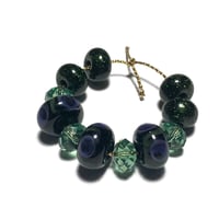 Image 4 of 11PC. GLITTER PEACOCK & SWAROVSKI Hand made Beads//Peacock feather pattern//Glitter Glass Donut bead
