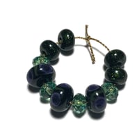 Image 7 of 11PC. GLITTER PEACOCK & SWAROVSKI Hand made Beads//Peacock feather pattern//Glitter Glass Donut bead