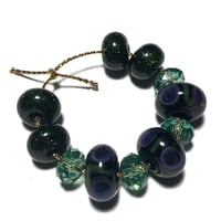 Image 1 of 11PC. GLITTER PEACOCK & SWAROVSKI Hand made Beads//Peacock feather pattern//Glitter Glass Donut bead