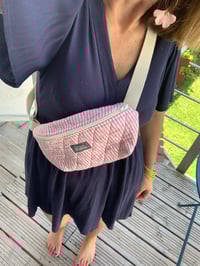 Image 1 of Banane rayée rose