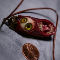 Image 2 of Duel Iris "Screaming Behelit", flash reflective+glow in the dark eyes - Morgans Mutations
