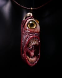 Image 1 of Duel Iris "Screaming Behelit", flash reflective+glow in the dark eyes - Morgans Mutations
