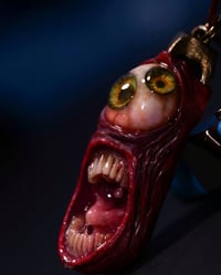 Image 3 of Duel Iris "Screaming Behelit", flash reflective+glow in the dark eyes - Morgans Mutations