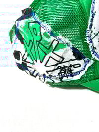 Image of The Whole World Trucker in Green