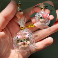 Image 2 of Grass baby wearing fish hats keychains