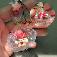 Image 3 of Grass baby wearing fish hats keychains