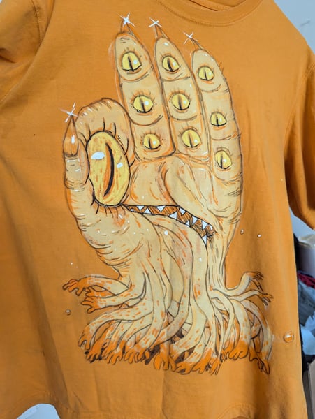 Image of The Hand That Sees yellow art shirt, Size L