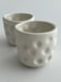 Image of a pair of porcelain beakers 1