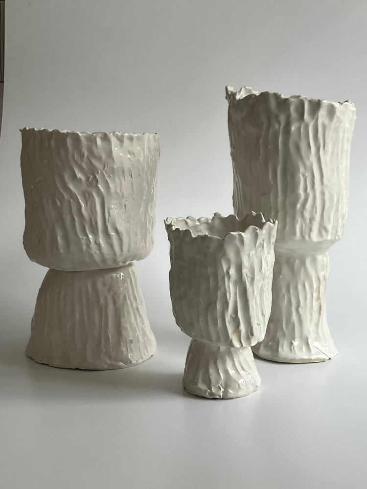 Image of three porcelain vessels