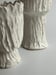 Image of three porcelain vessels