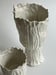 Image of three porcelain vessels