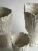 Image of three porcelain vessels