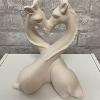 Image 1 of Hugging Giraffe's