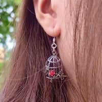 Image 2 of Red Gem Crow and Cage Asymmetric Earrings