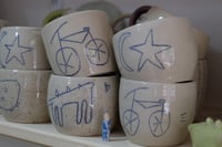Image 1 of Illustrated mugs.