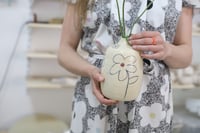 Image 1 of Flower vase. 