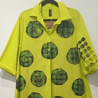 Image 1 of lime green painted shirt