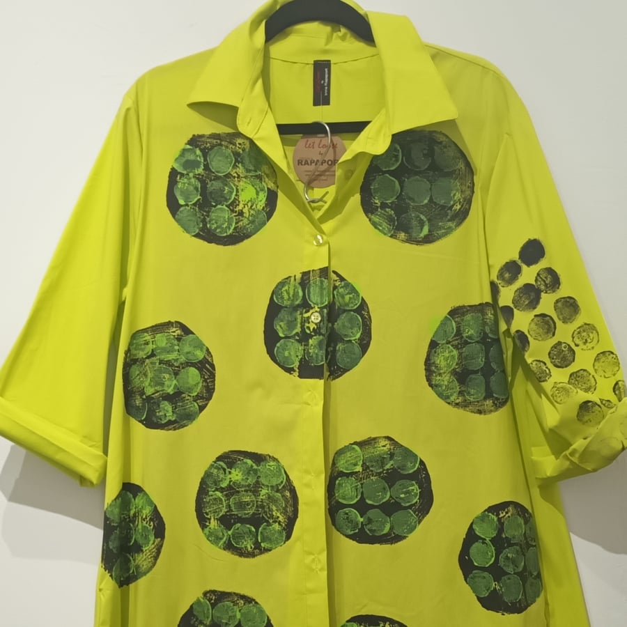 Image of lime green painted shirt
